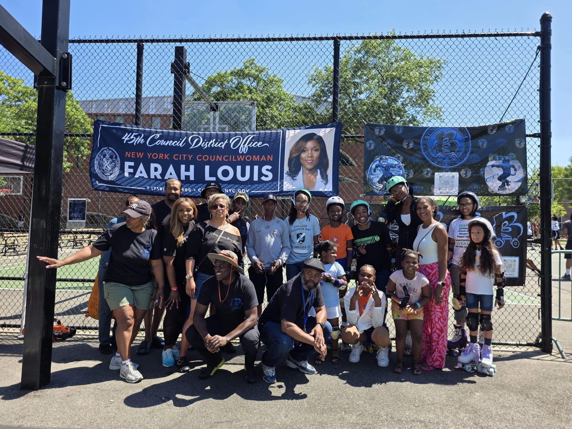 Blue Skate community members and families at a skating event with local elected officials